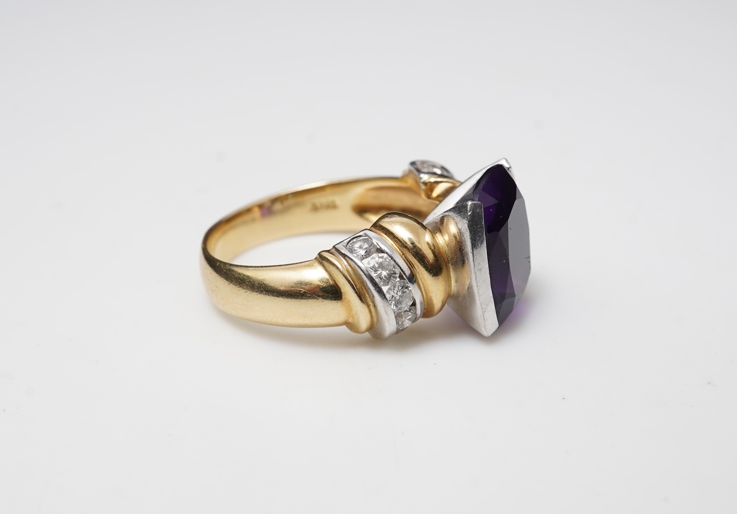 An amethyst and diamond ring
